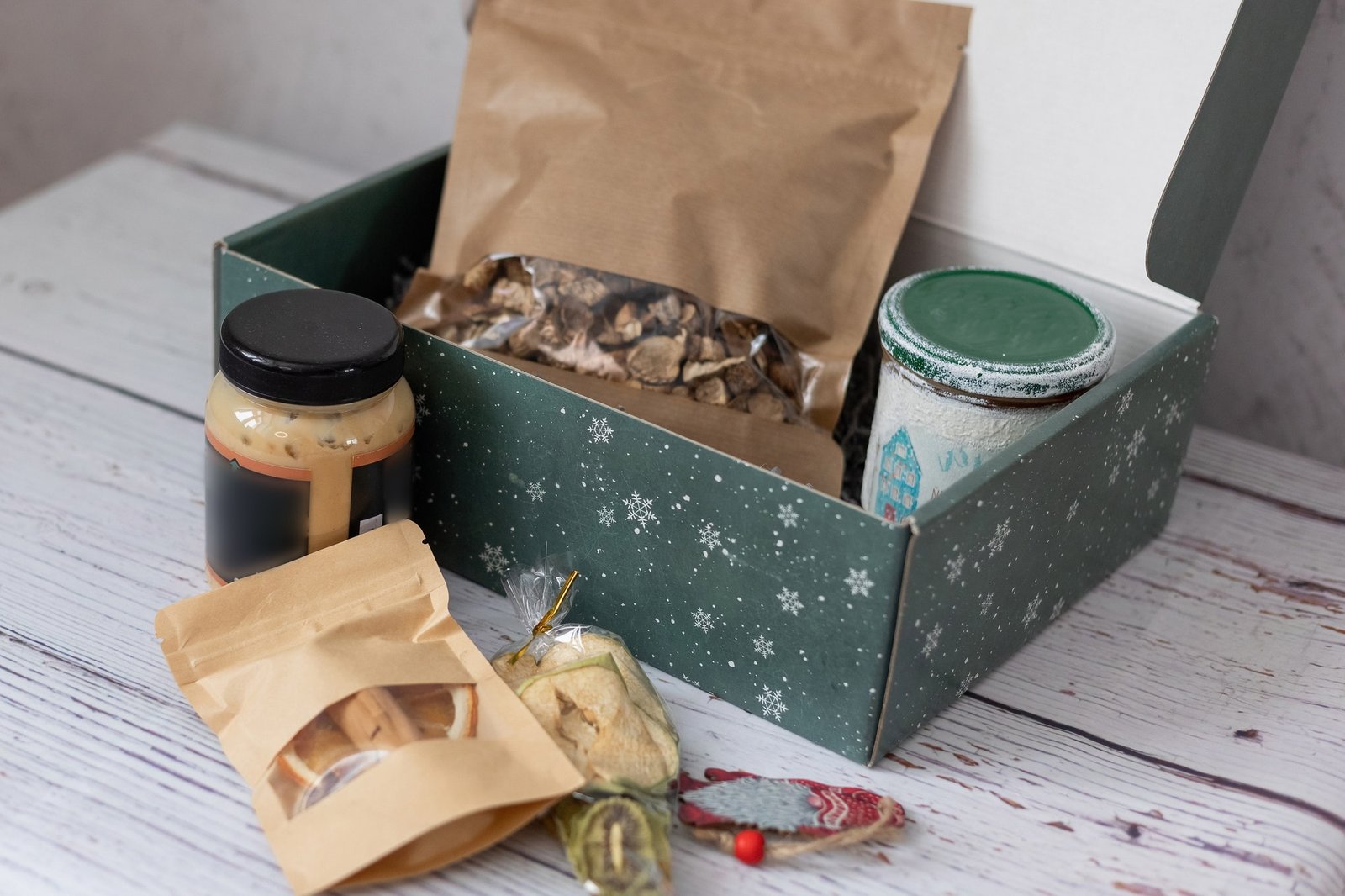 the-idea-of-packaging-and-gift-a-box-for-an-autumn-or-winter-gift-with-sweets-and-dried-vegetables-.jpg